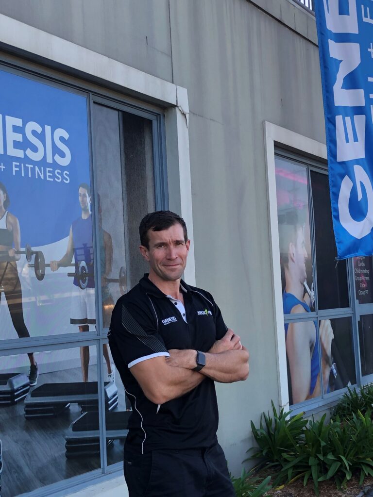 John Pirlo standing in front of Genesis gym